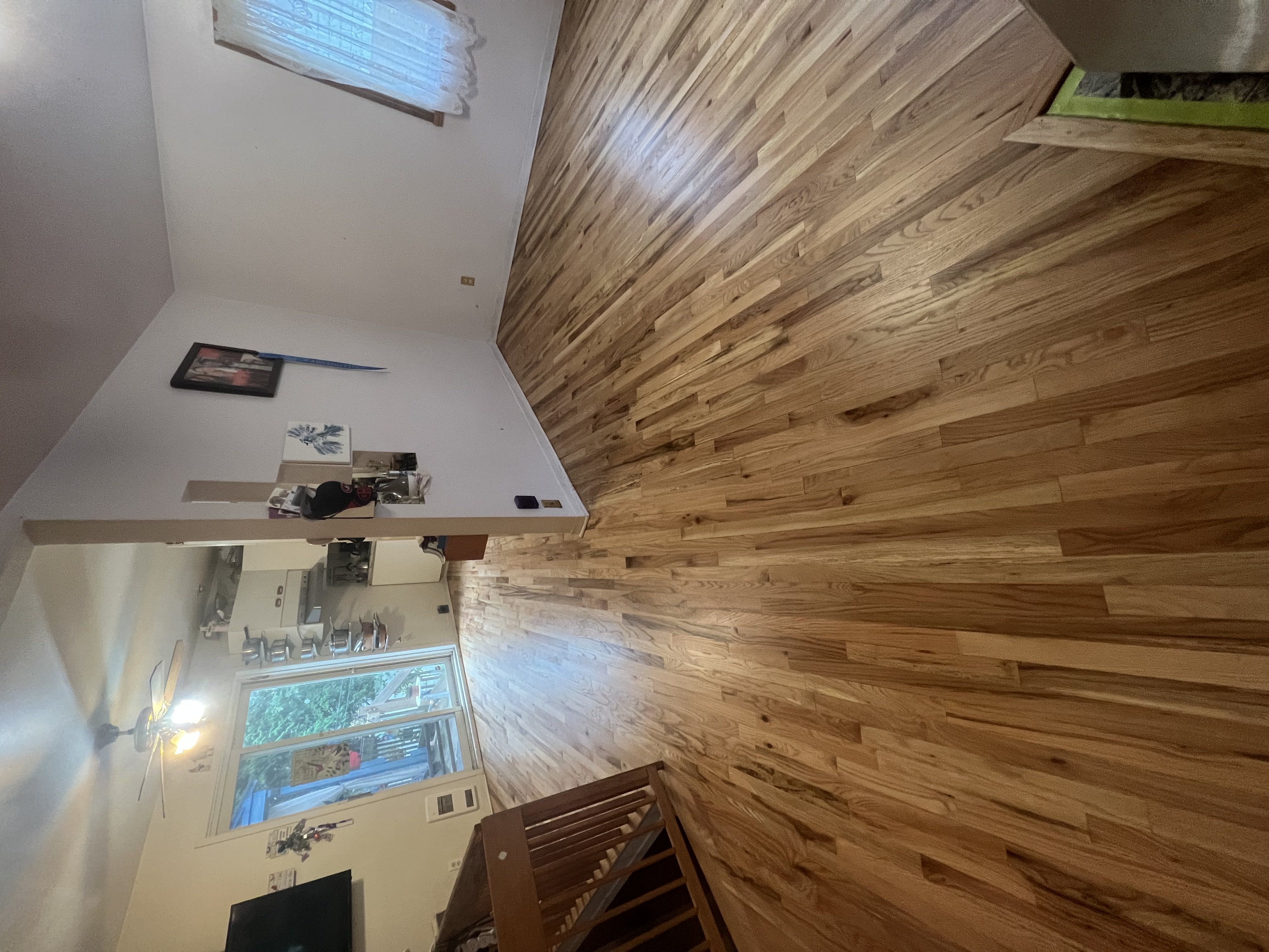 Stunningly stained hardwood floor by JA Planchers